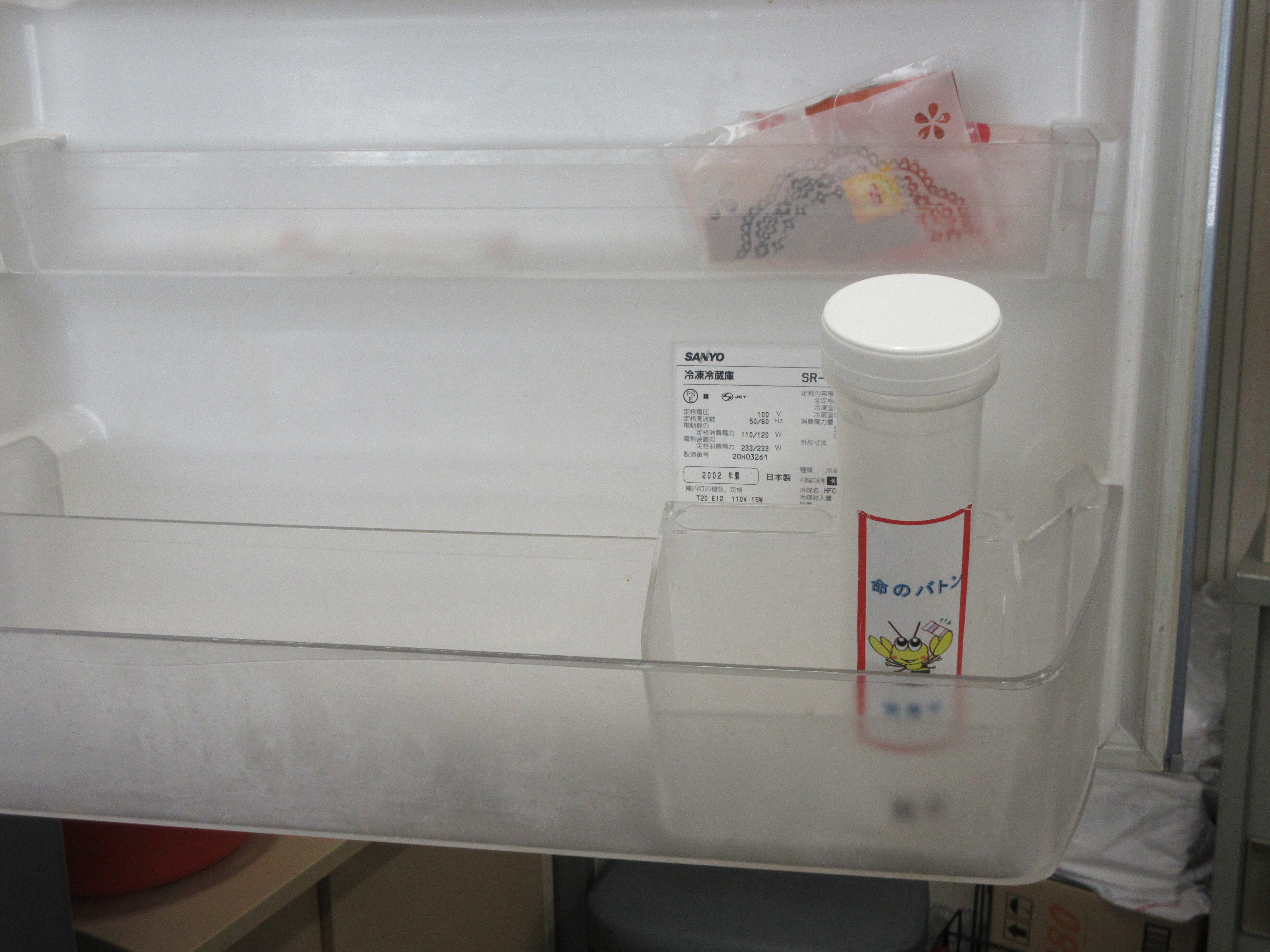冷蔵庫ドアのポケットに入れた命のバトン